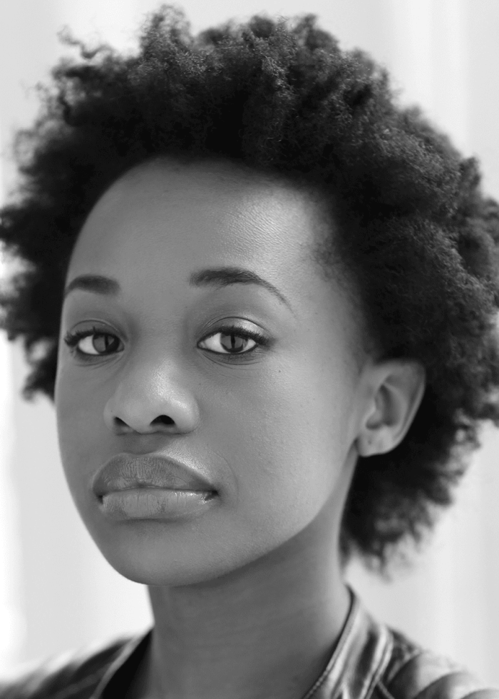 Mirirai Sithole portrait, looking directly at the camera, black and white