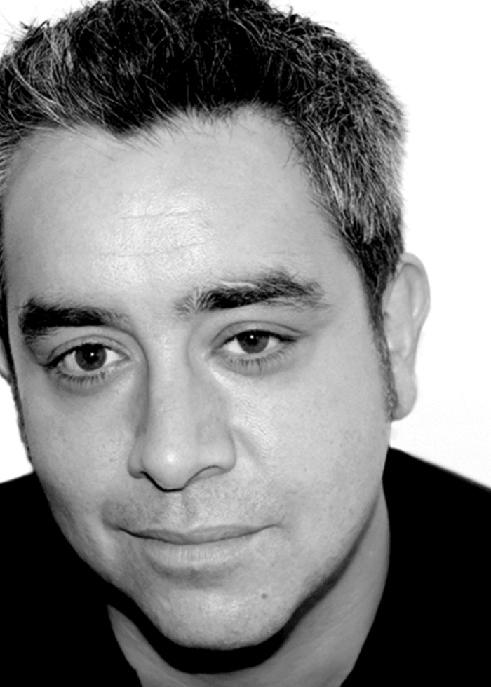 Close-up portrait of Stephen Adly Guirgis, playwright and author.