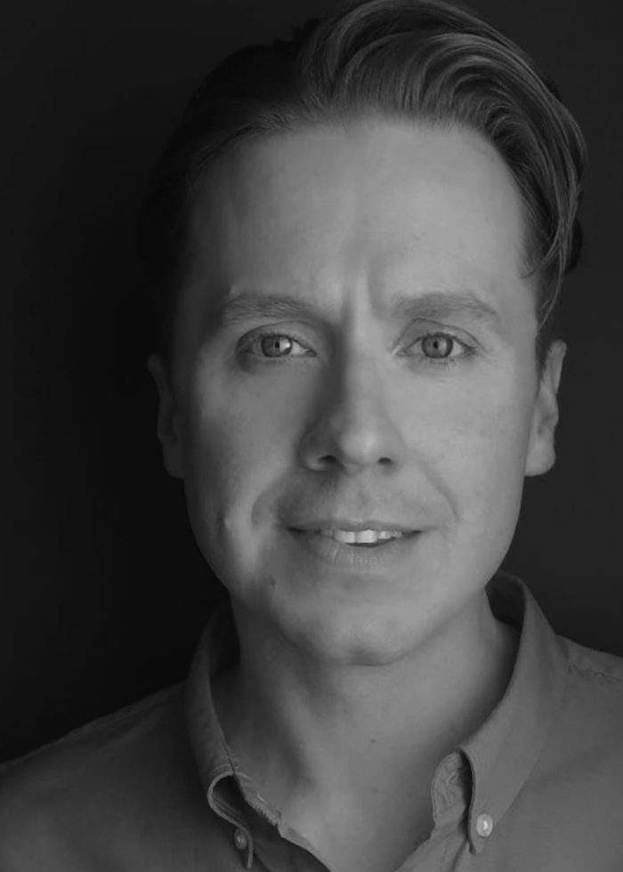 Close-up black and white portrait of Steven Booth