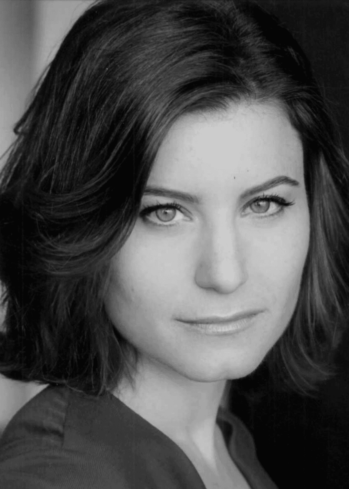 Susan Pourfar portrait in black and white, looking at the camera