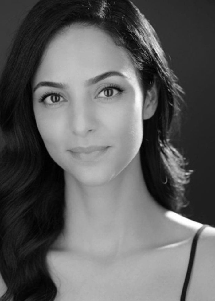 Tala Ashe portrait in black and white, looking at the camera