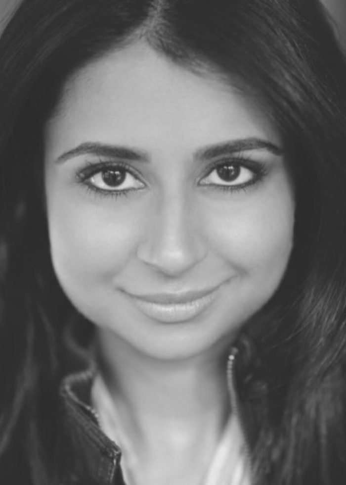 Mahira Kakkar smiling, looking directly at the camera