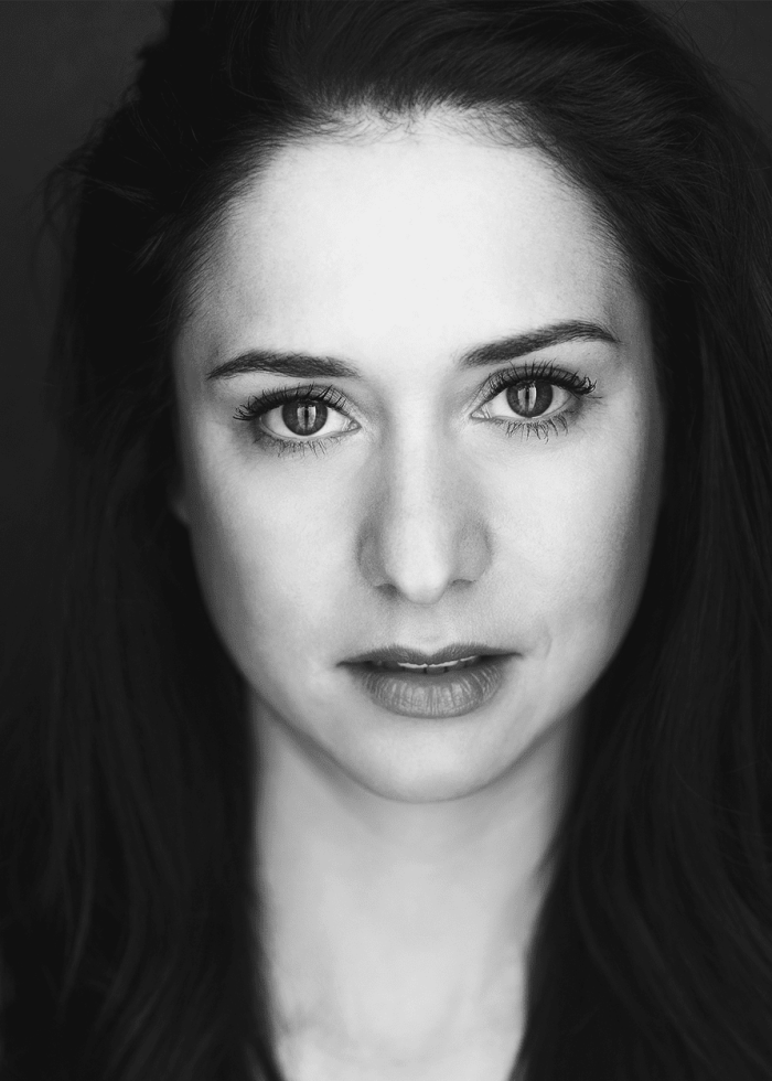 Close-up portrait of Ariana Venturi, looking directly at the camera.