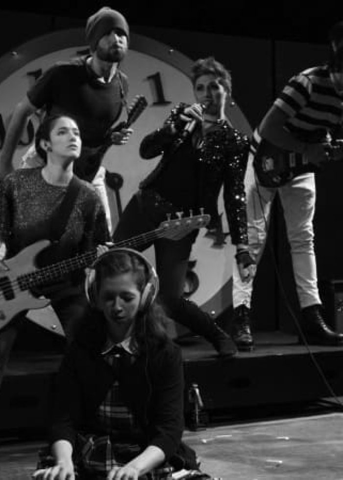 Rock band performing on stage in New York City. March 2017 event.