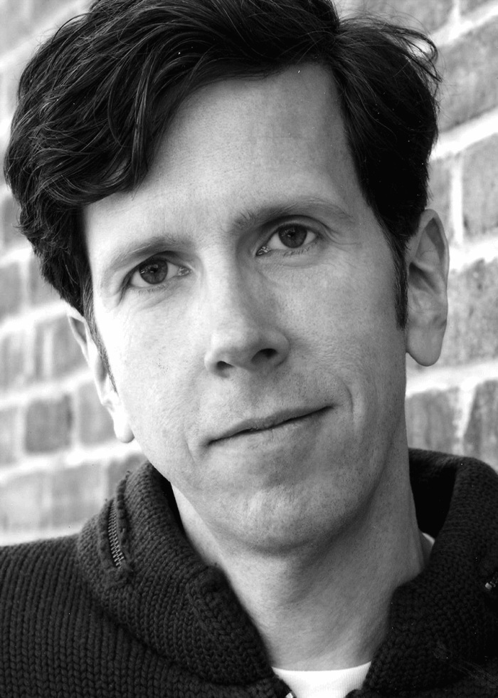 Robert Stanton, actor, in a black and white headshot