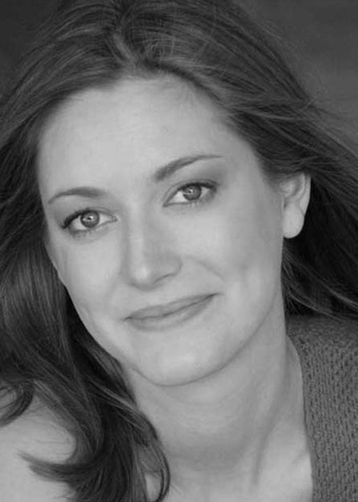 Zoe Perry, actress, smiling in a headshot